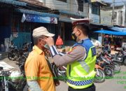Perangi Penyebaran C – 19, Unit Lantas Polsek Bgs Bagikan Masker dan Sosialisasi Prokes