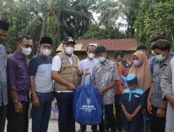 Wabup Husni Merza Salurkan Bantuan Kebakaran